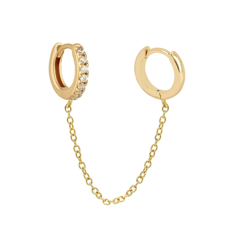 Boucle d'oreille double trou avec zircon blanc