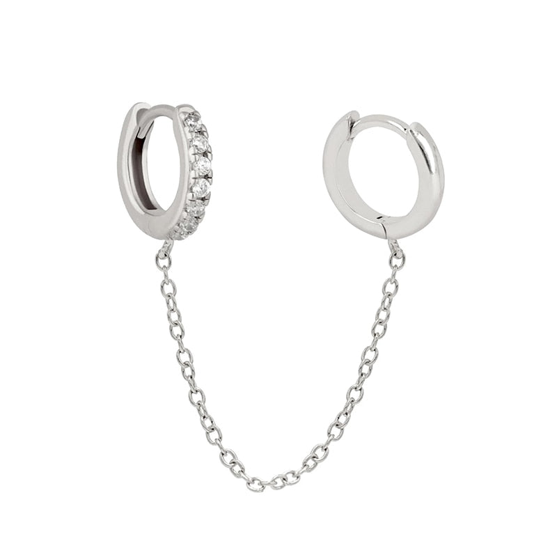Boucle d'oreille double trou avec zircon blanc