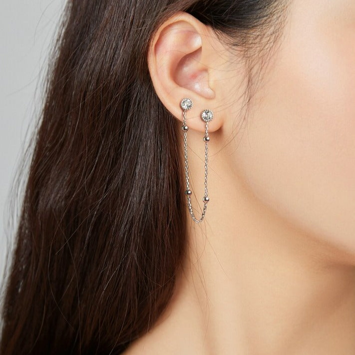 Boucle d'oreille deux trous avec clous et longue chaîne