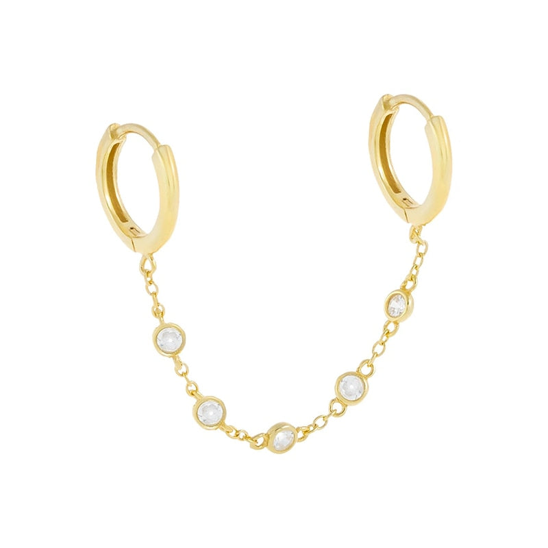 Boucle d'oreille double trou avec zircon blanc