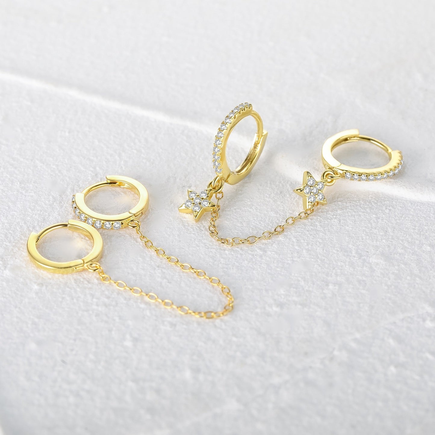 Boucle d'oreille double trou avec zircon blanc