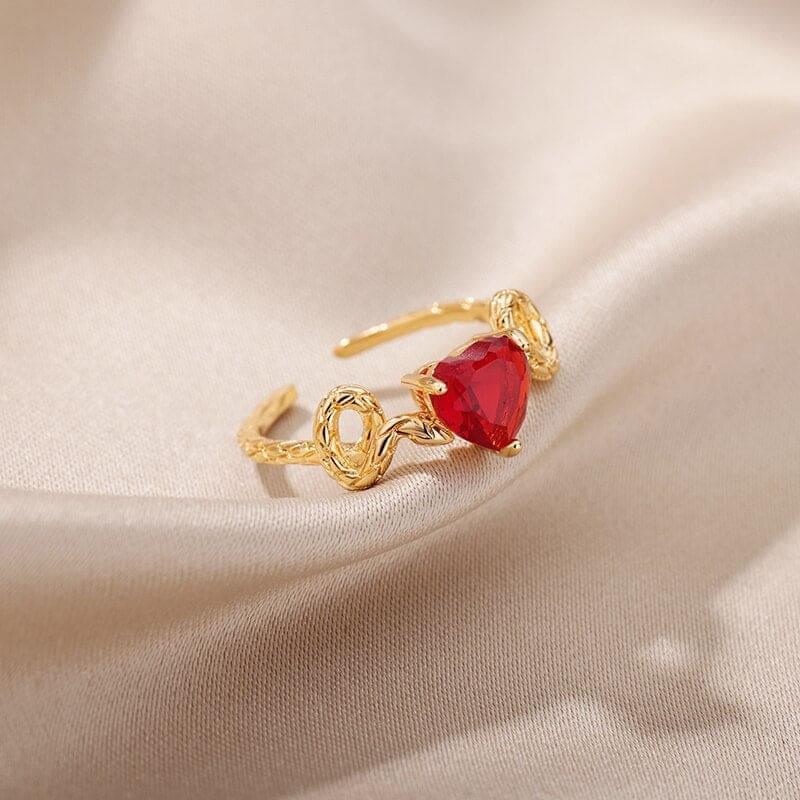 Bague de pouce avec coeur rouge
