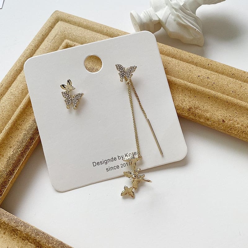 Boucle d’oreille chaine avec papillons
