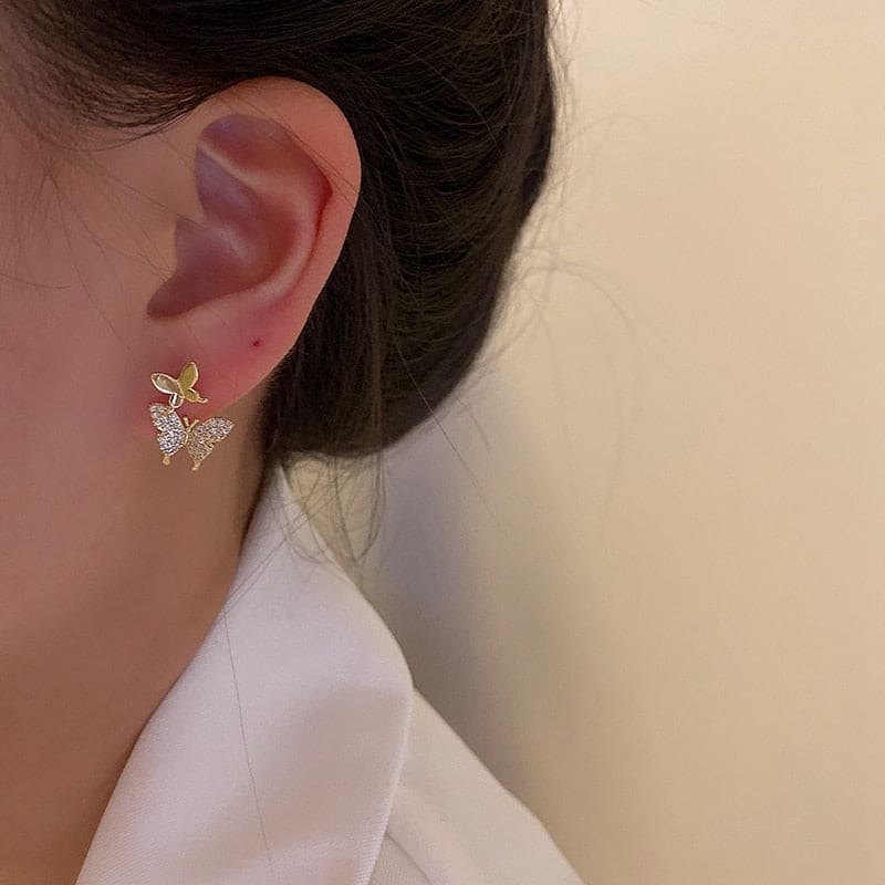 Boucle d’oreille chaine avec papillons