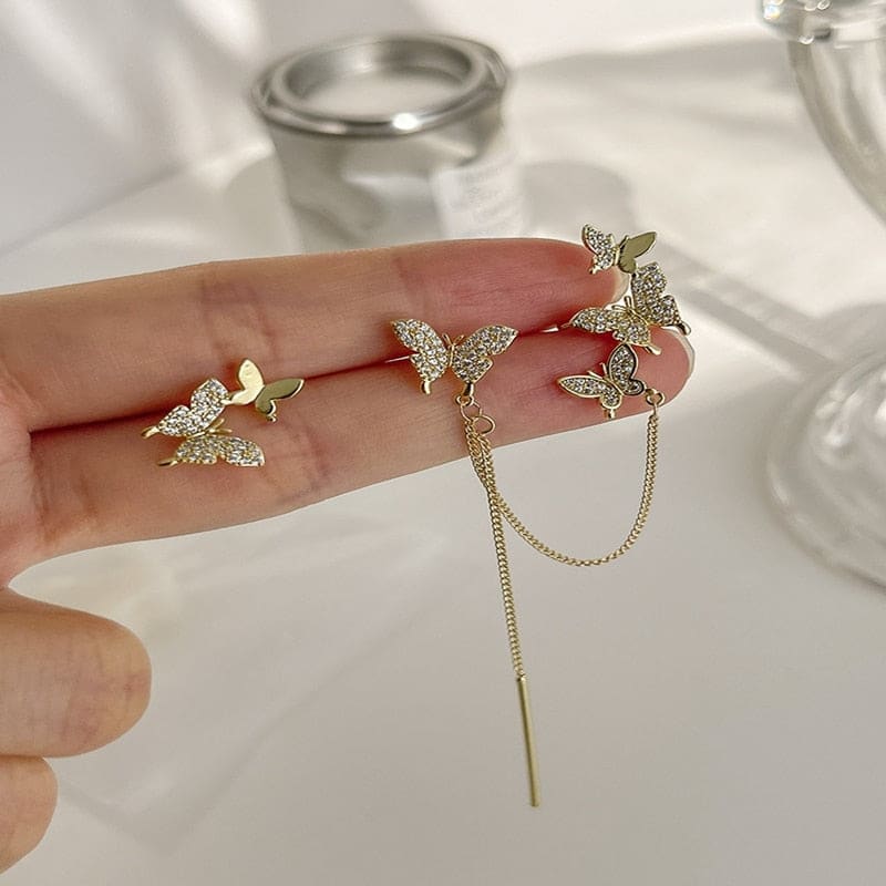 Boucle d’oreille chaine avec papillons