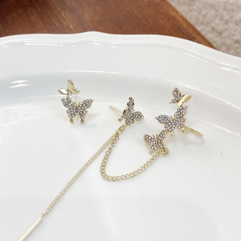 Boucle d’oreille chaine avec papillons