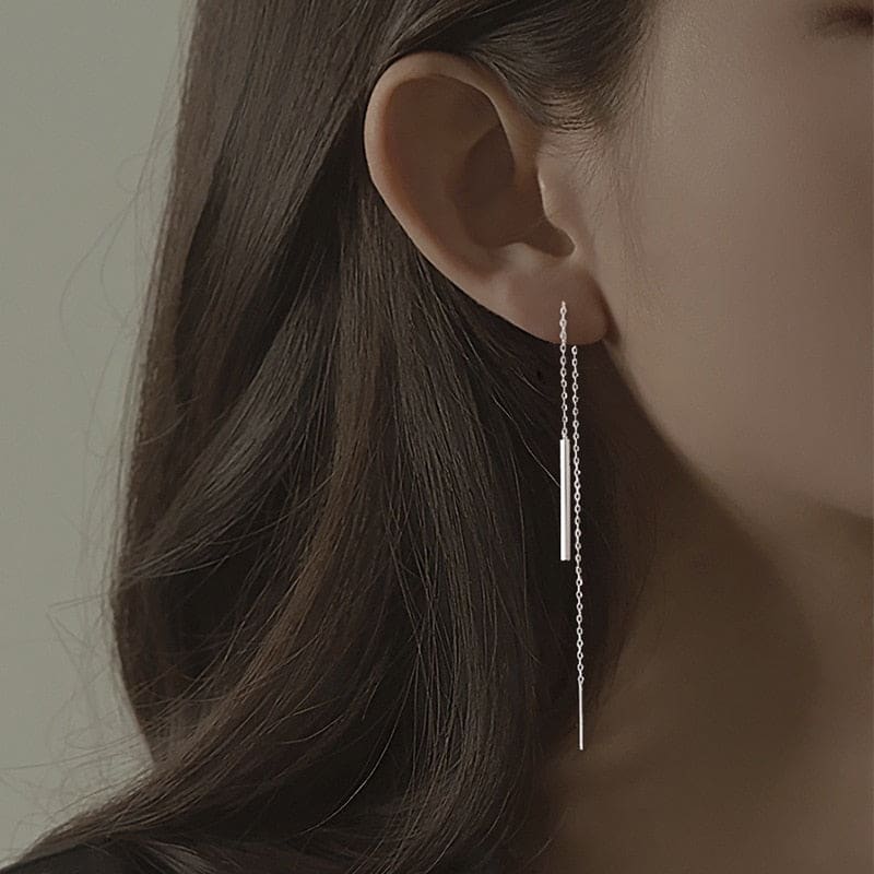 Boucle d’oreille chaine traversante argent
