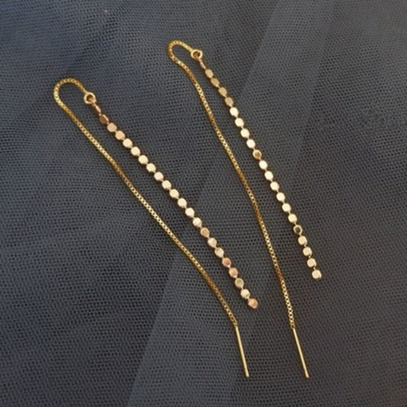Boucle d’oreille chaine traversante longue