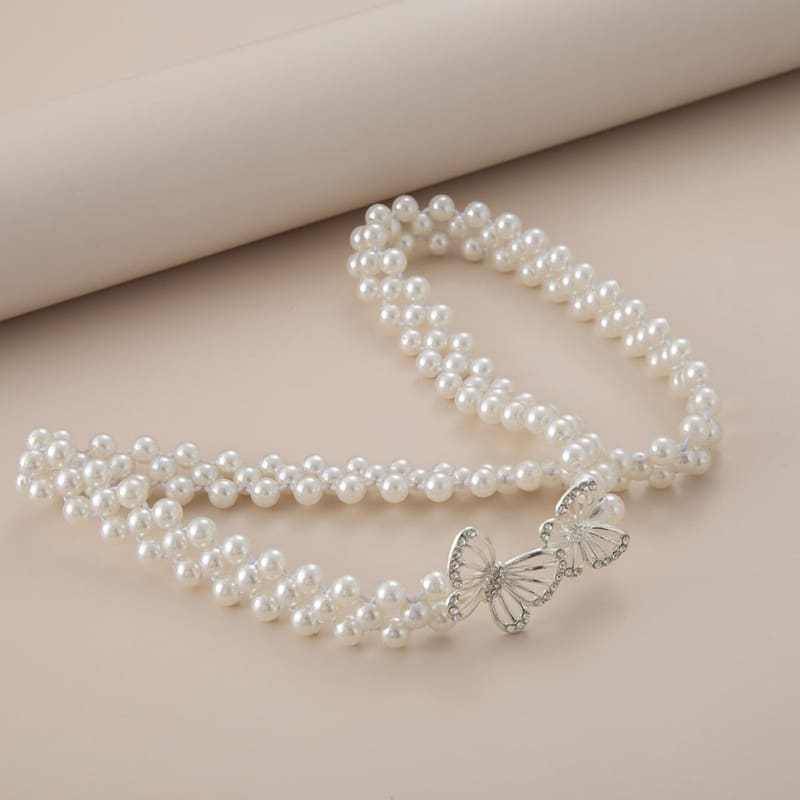 Ceinture chaine perle et papillon