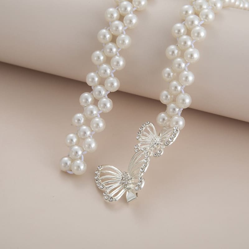 Ceinture chaine perle et papillon
