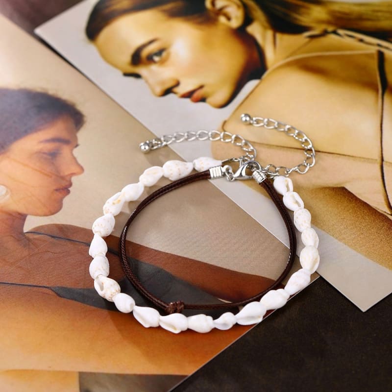 Chaine de cheville cuir et coquillage