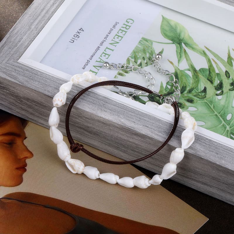Chaine de cheville cuir et coquillage