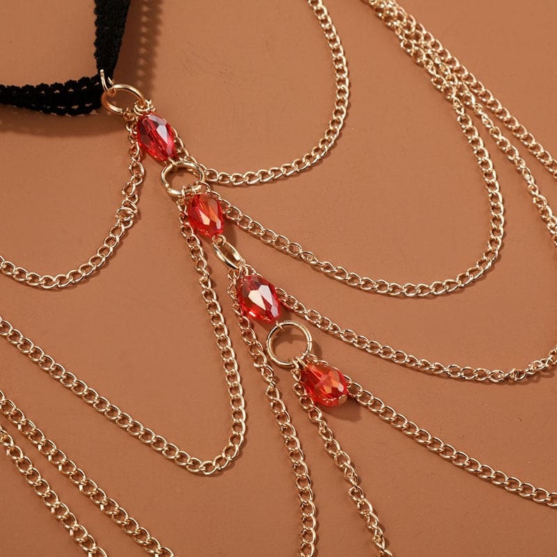 Chaine de cuisse aux perles rouges