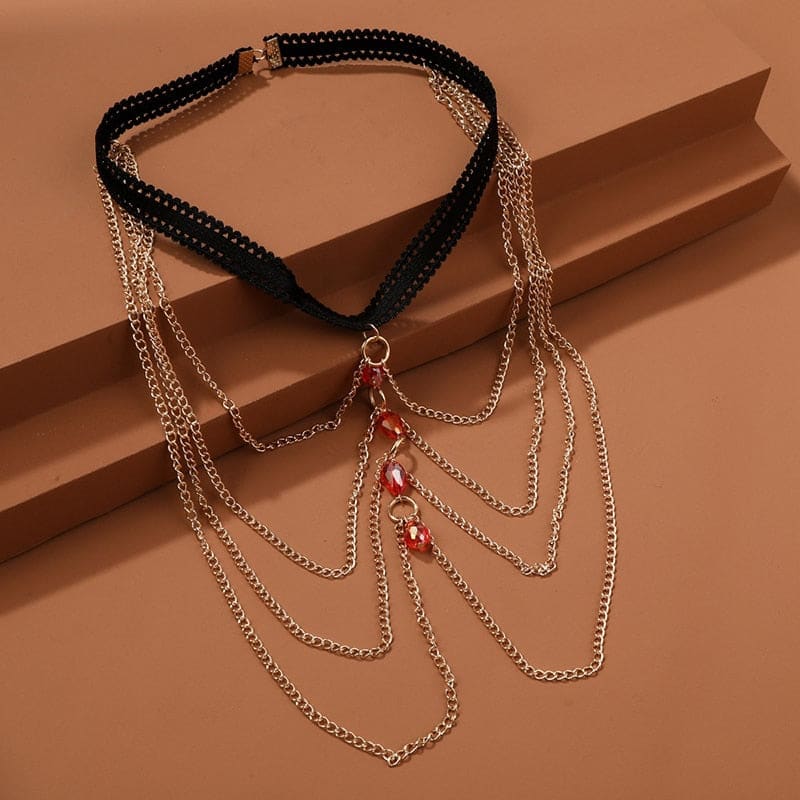 Chaine de cuisse aux perles rouges