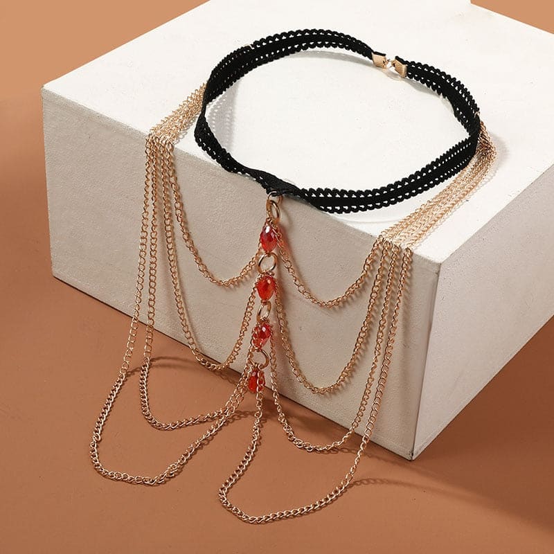 Chaine de cuisse aux perles rouges