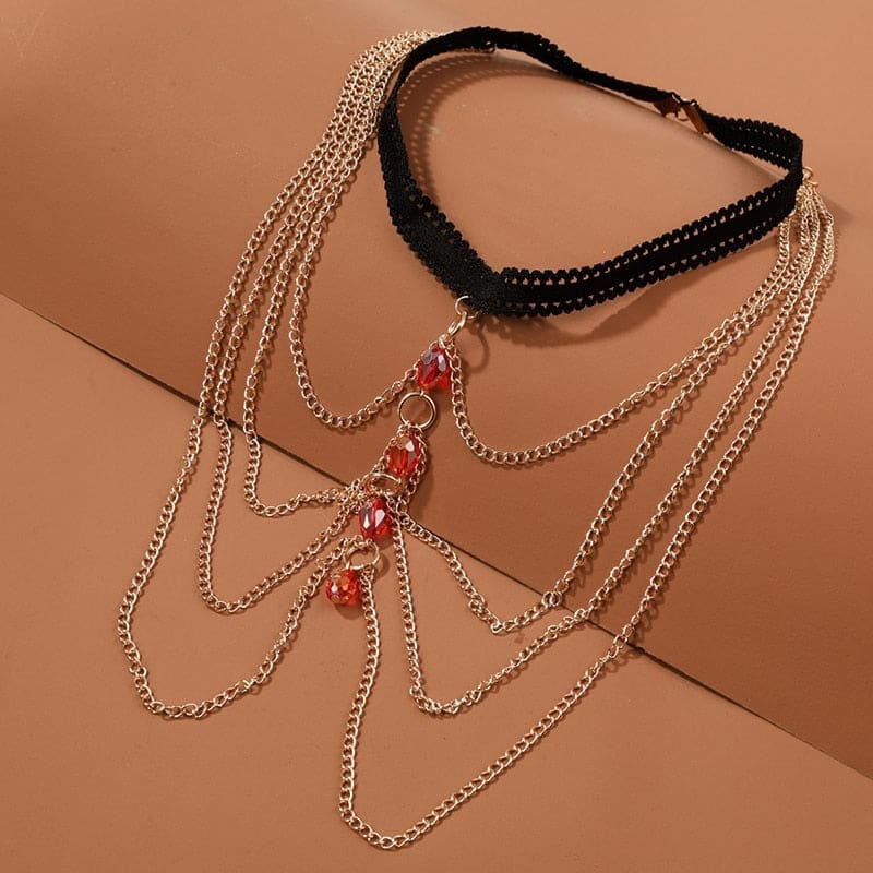 Chaine de cuisse aux perles rouges