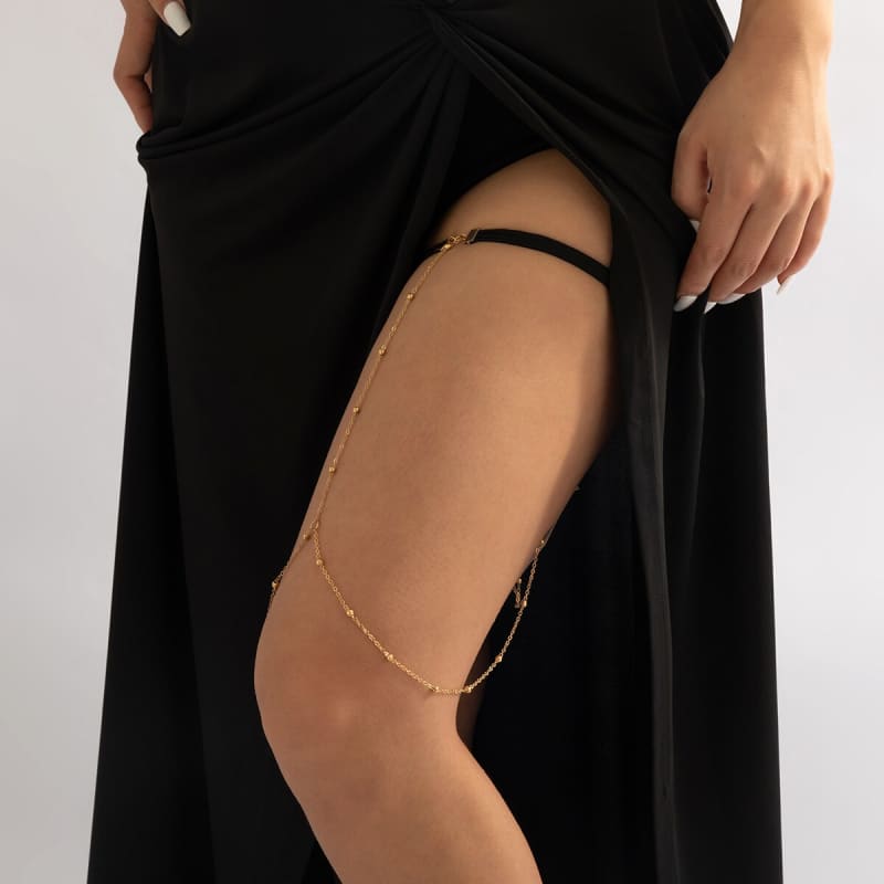 Chaine de cuisse aux petites perles dorées