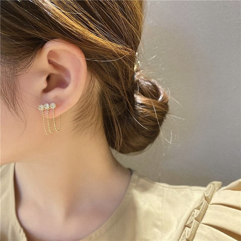 Triple boucle d’oreille chaine