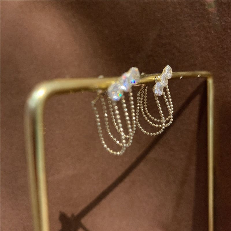 Triple boucle d’oreille chaine