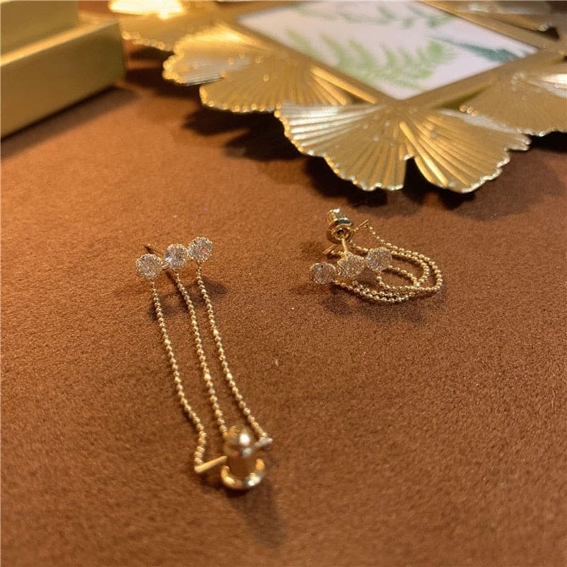 Triple boucle d’oreille chaine