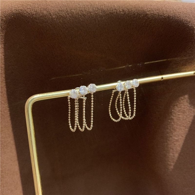 Triple boucle d’oreille chaine