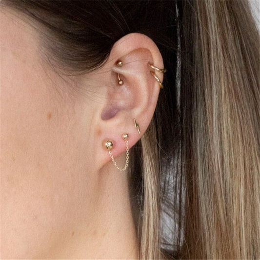 Boucle d’oreille chaine 2 trous boule dorée