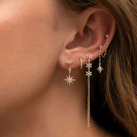 Boucle d’oreille chaine 2 trous pendante avec étoiles