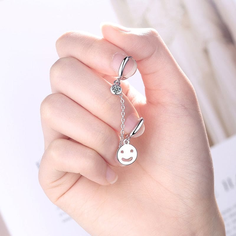 Boucle d’oreille chaine 2 trous visage souriant