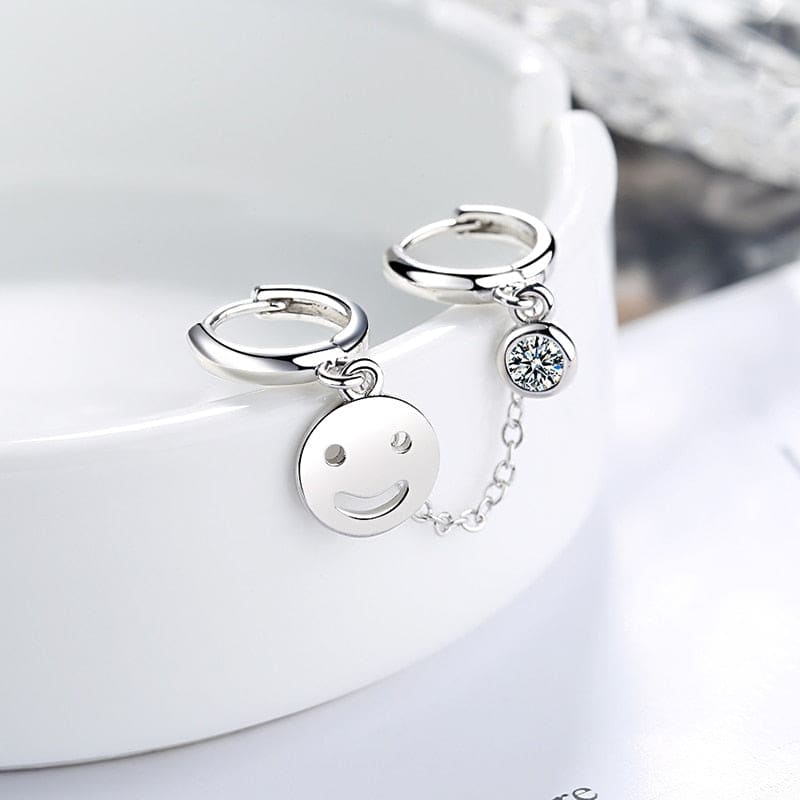 Boucle d’oreille chaine 2 trous visage souriant