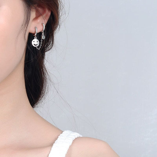 Boucle d’oreille chaine 2 trous visage souriant