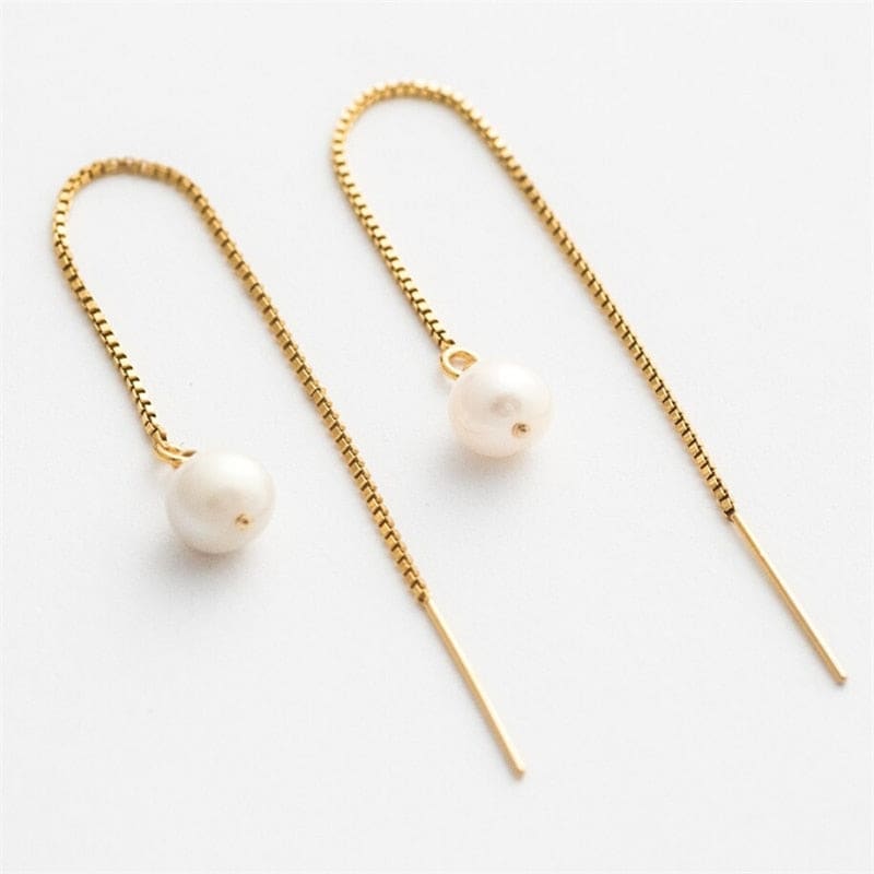 Boucle d’oreille chaine en or avec perle