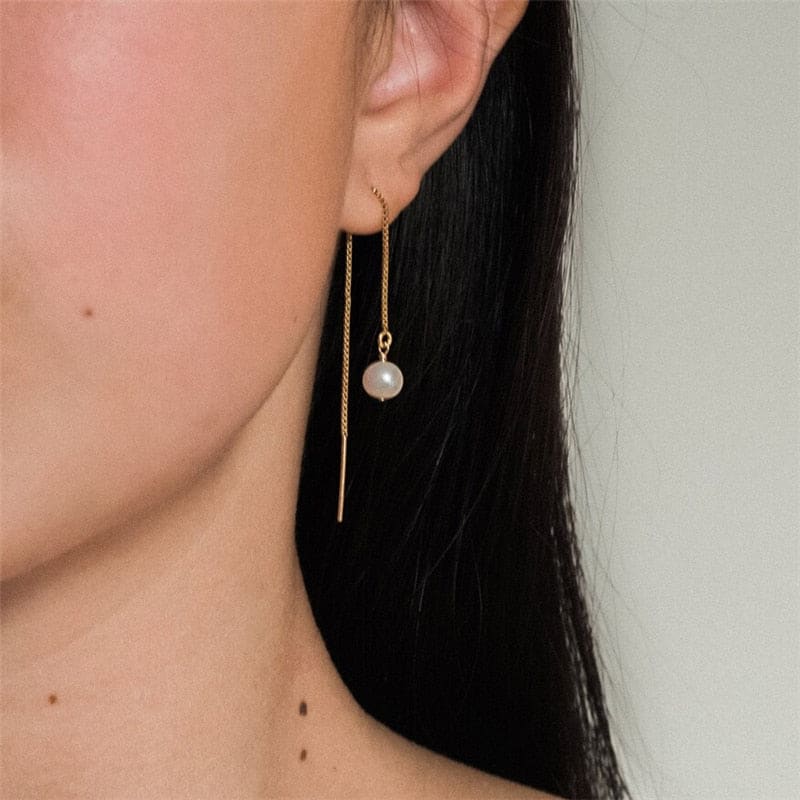 Boucle d’oreille chaine en or avec perle