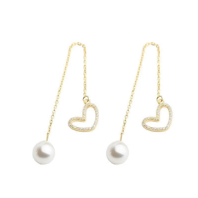 Boucle d’oreille chaine traversante avec coeur