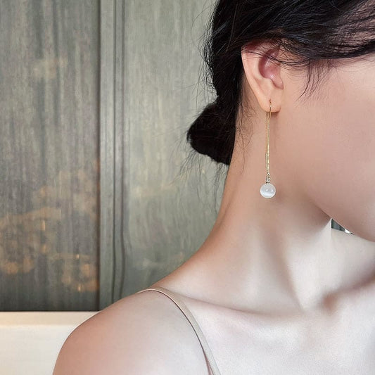Boucle d’oreille chaine traversante avec perle