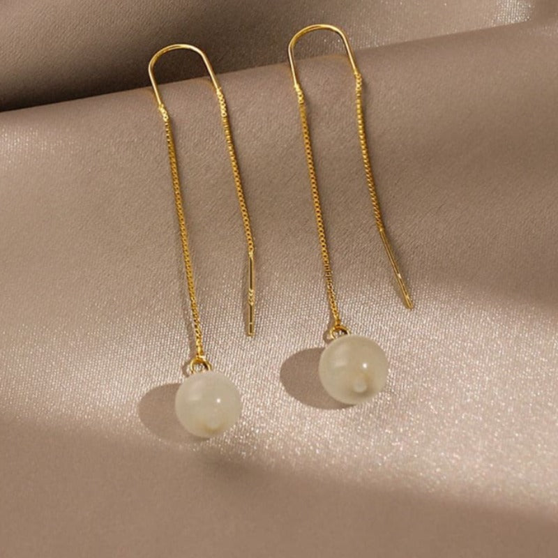 Boucle d’oreille chaine traversante avec perle