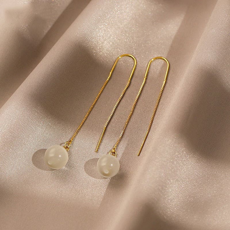 Boucle d’oreille chaine traversante avec perle