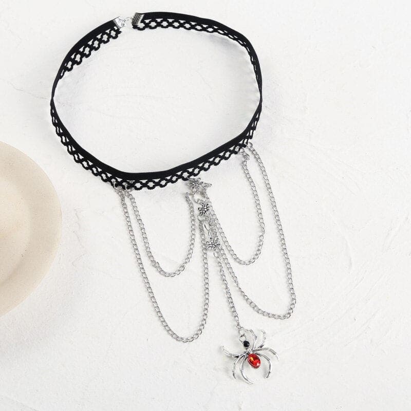 Chaine de cuisse avec araignée strass rouge