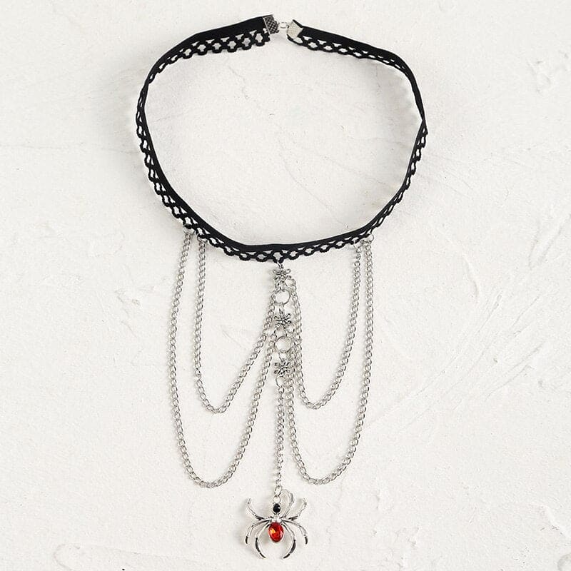 Chaine de cuisse avec araignée strass rouge