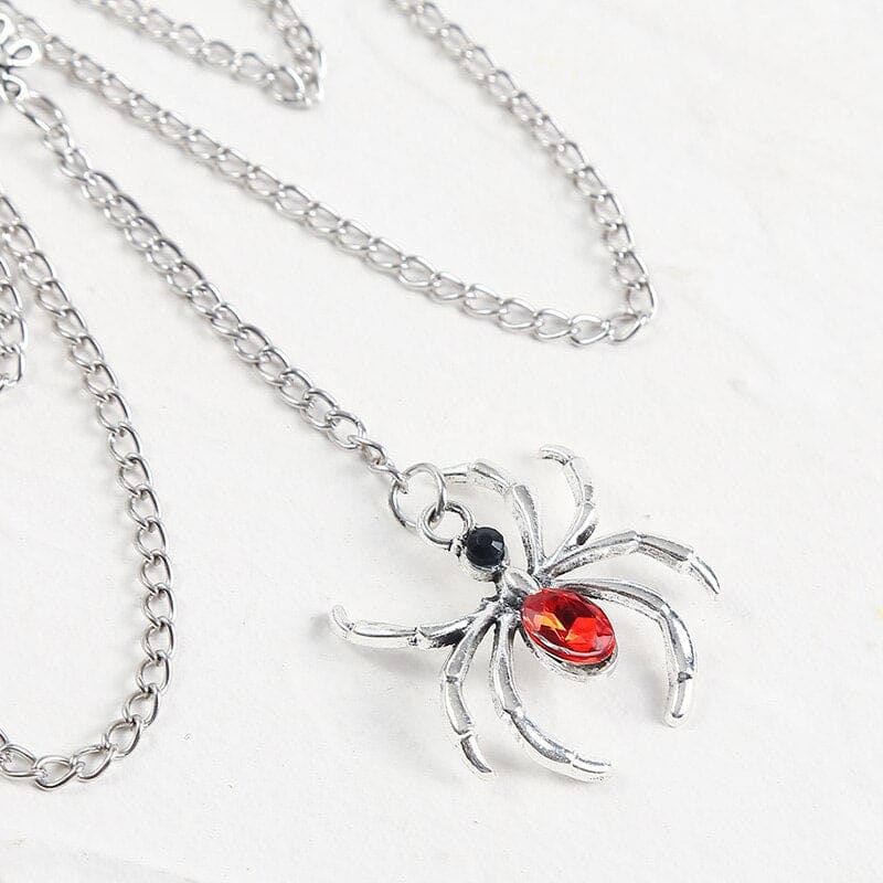 Chaine de cuisse avec araignée strass rouge