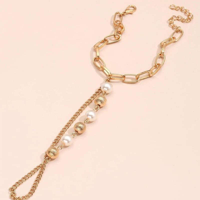 Chaine de main grosses perles