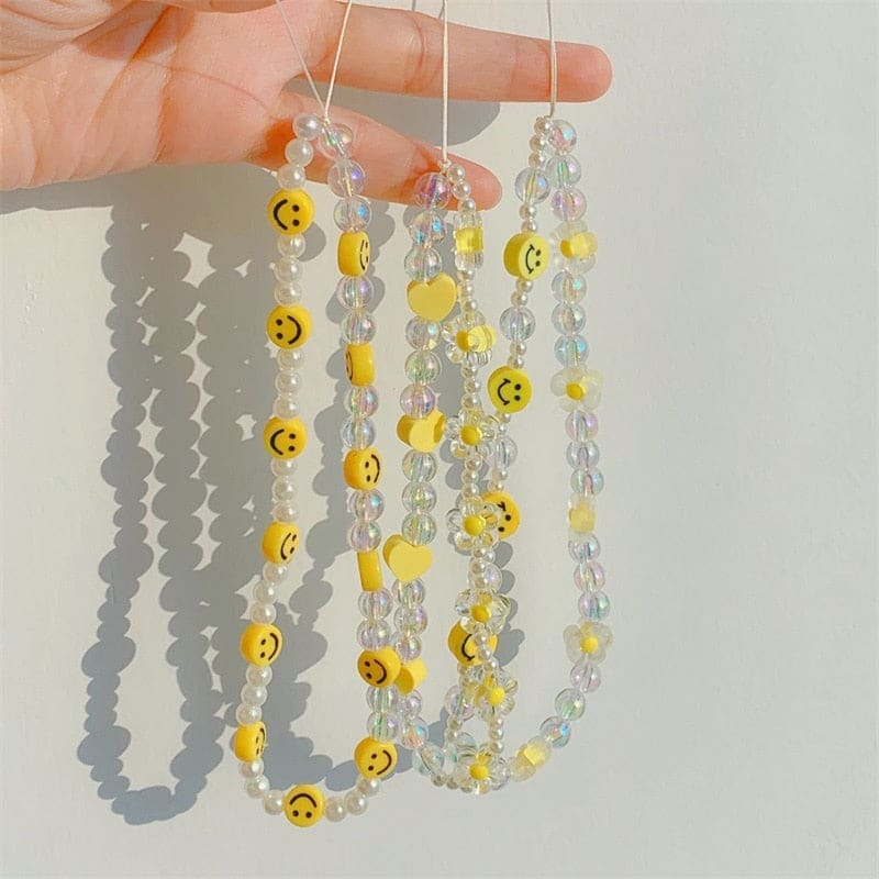 Chaine de téléphone perlée jaune universelle
