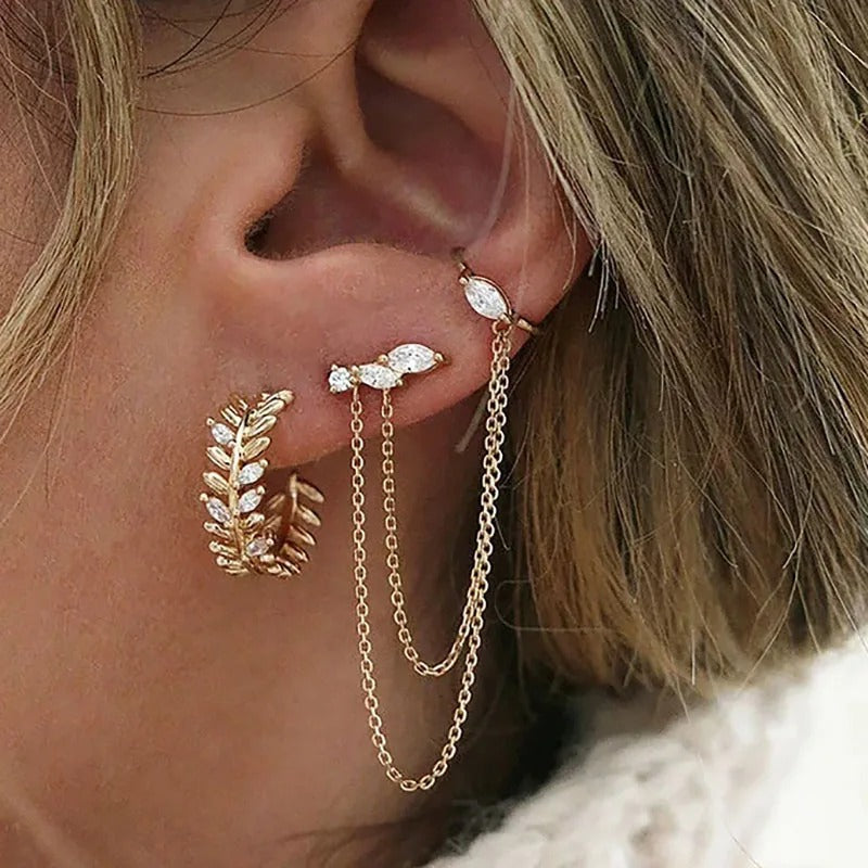Boucle d'oreille deux trous avec clous et longue chaîne