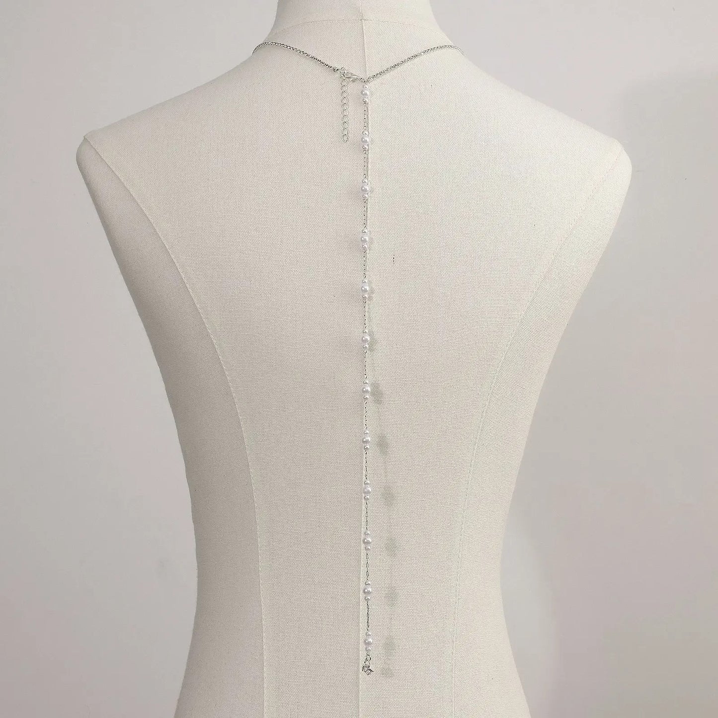 Collier de dos perle