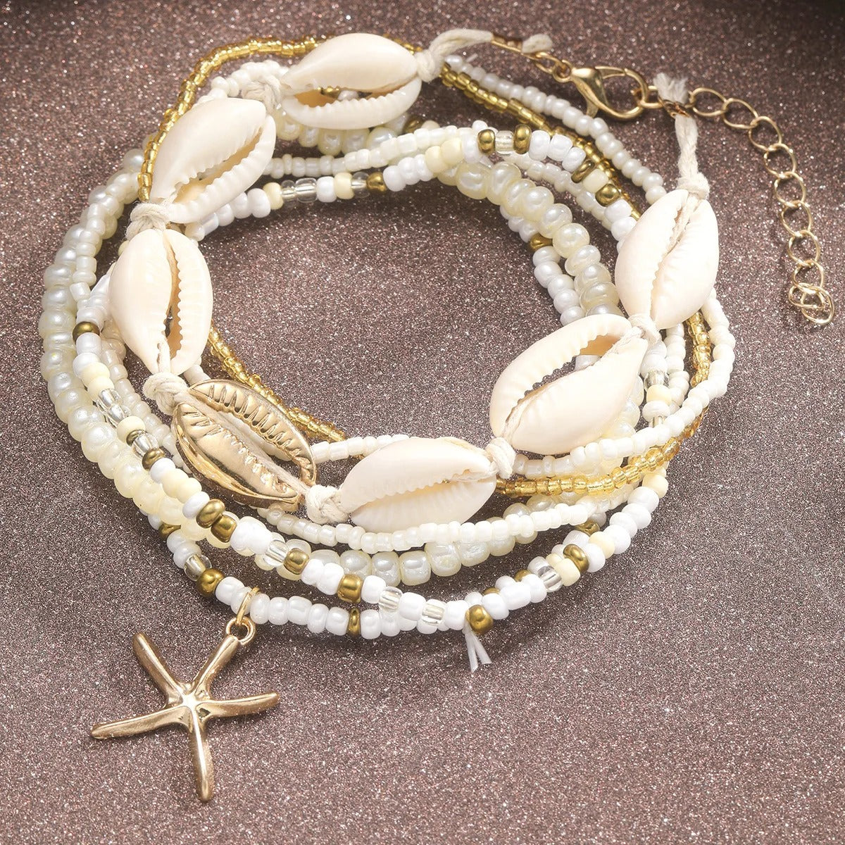 Chaine de cheville coquillage doré