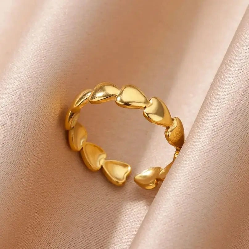 Bague de pouce avec petits coeurs