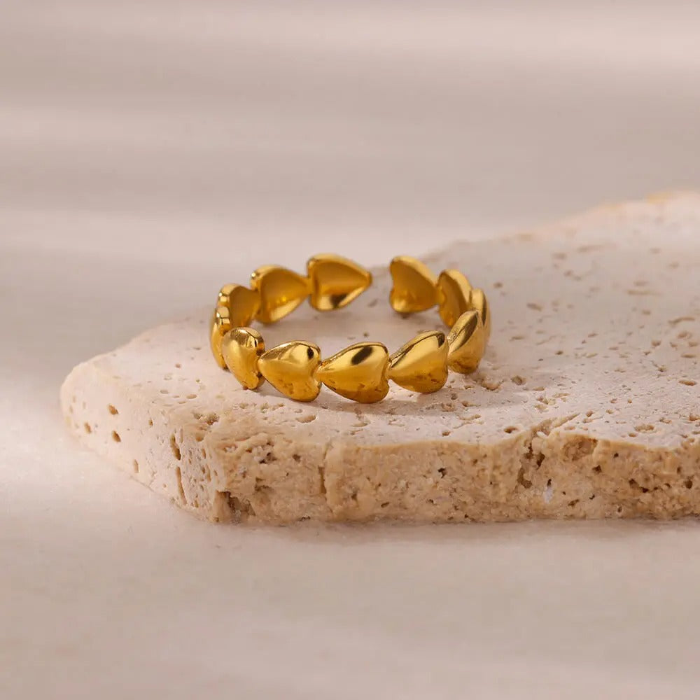 Bague de pouce avec petits coeurs