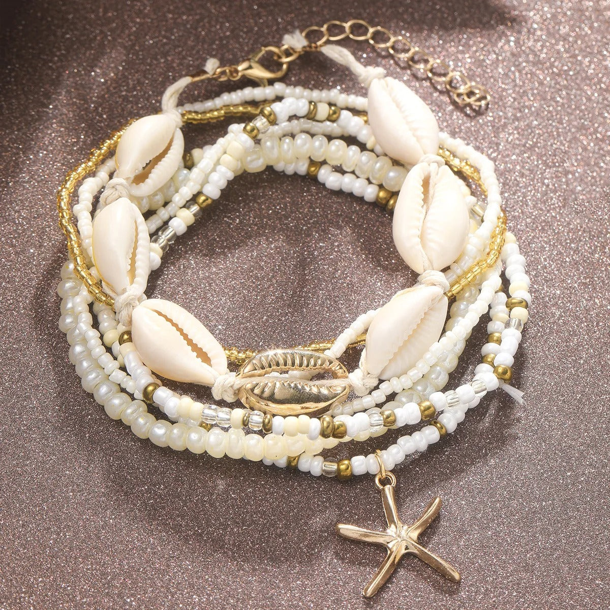 Chaine de cheville coquillage doré