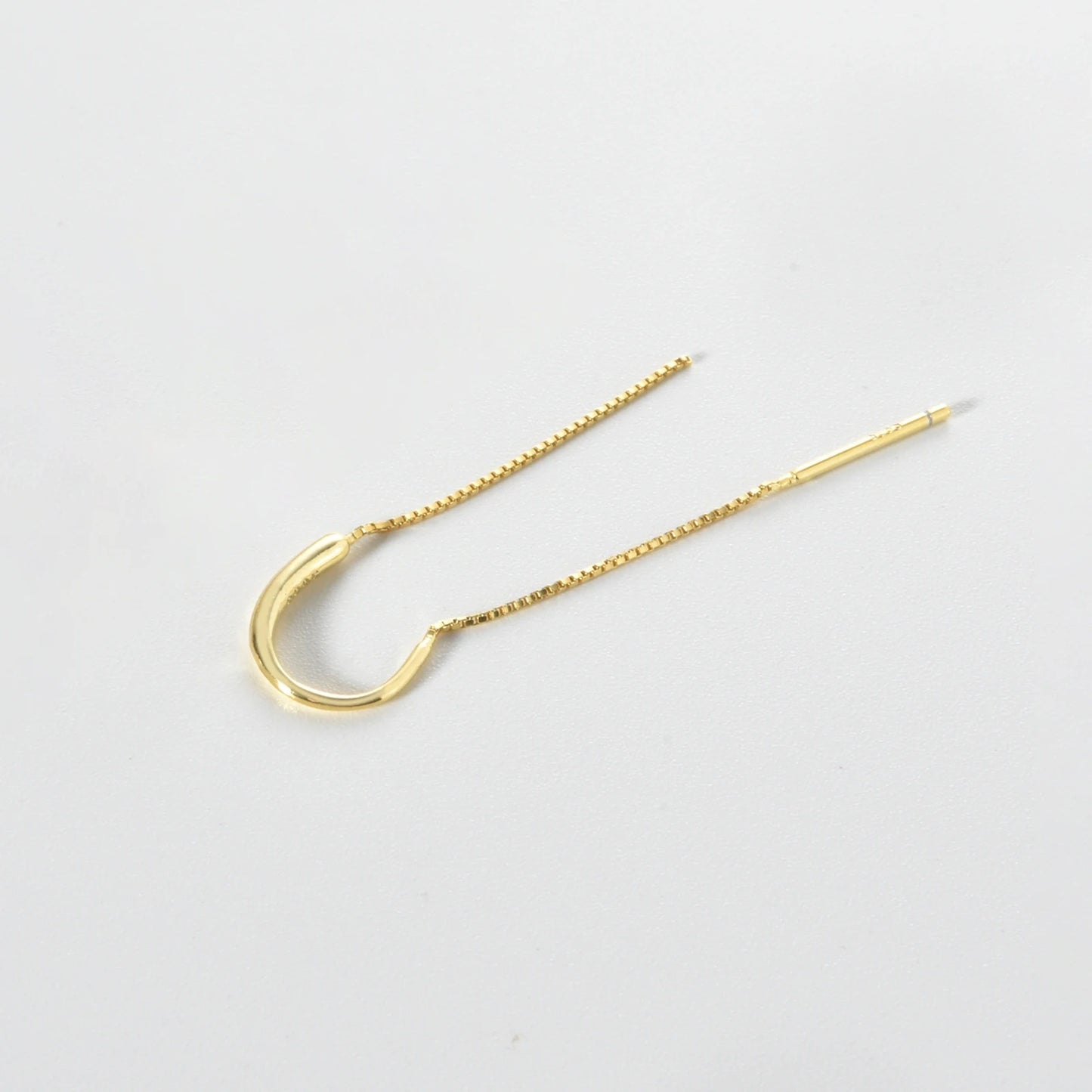 Boucle d'oreille chaine traversante or