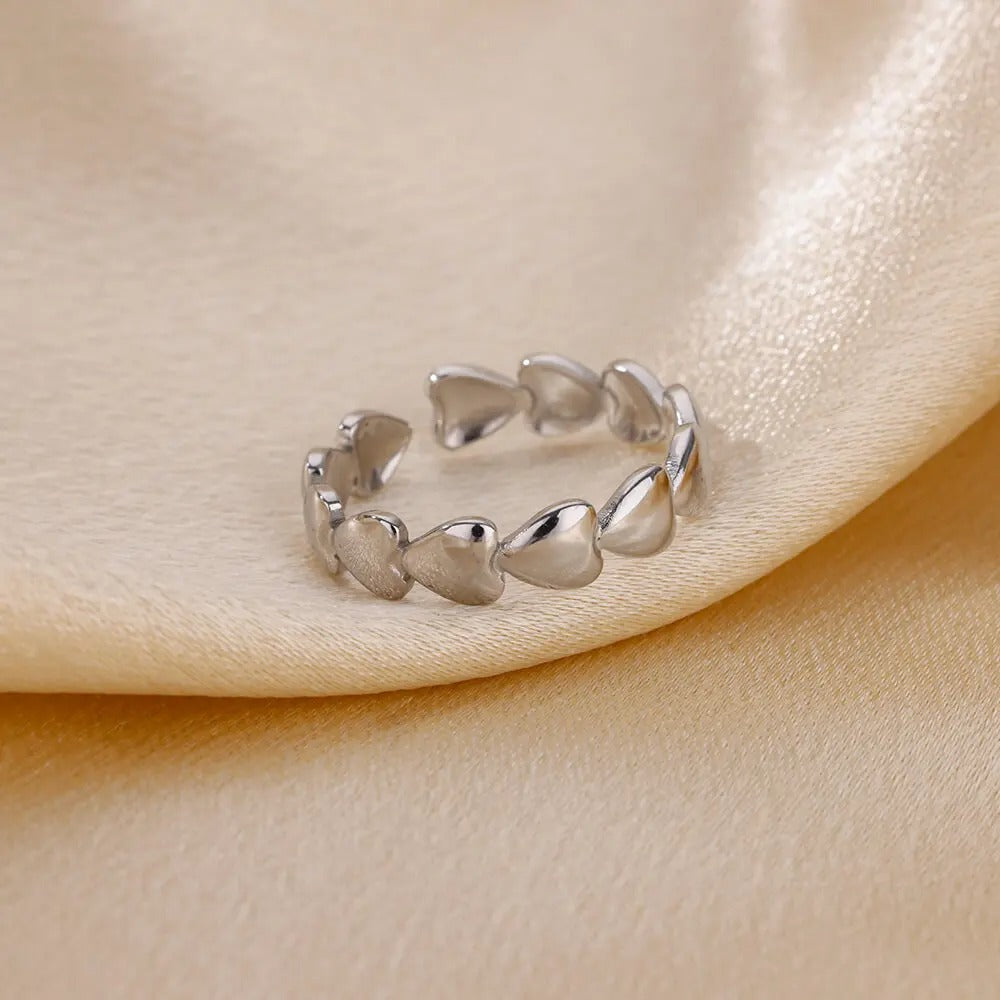 Bague de pouce avec petits coeurs