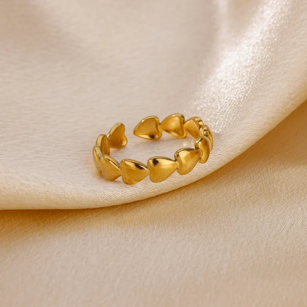 Bague de pouce avec petits coeurs
